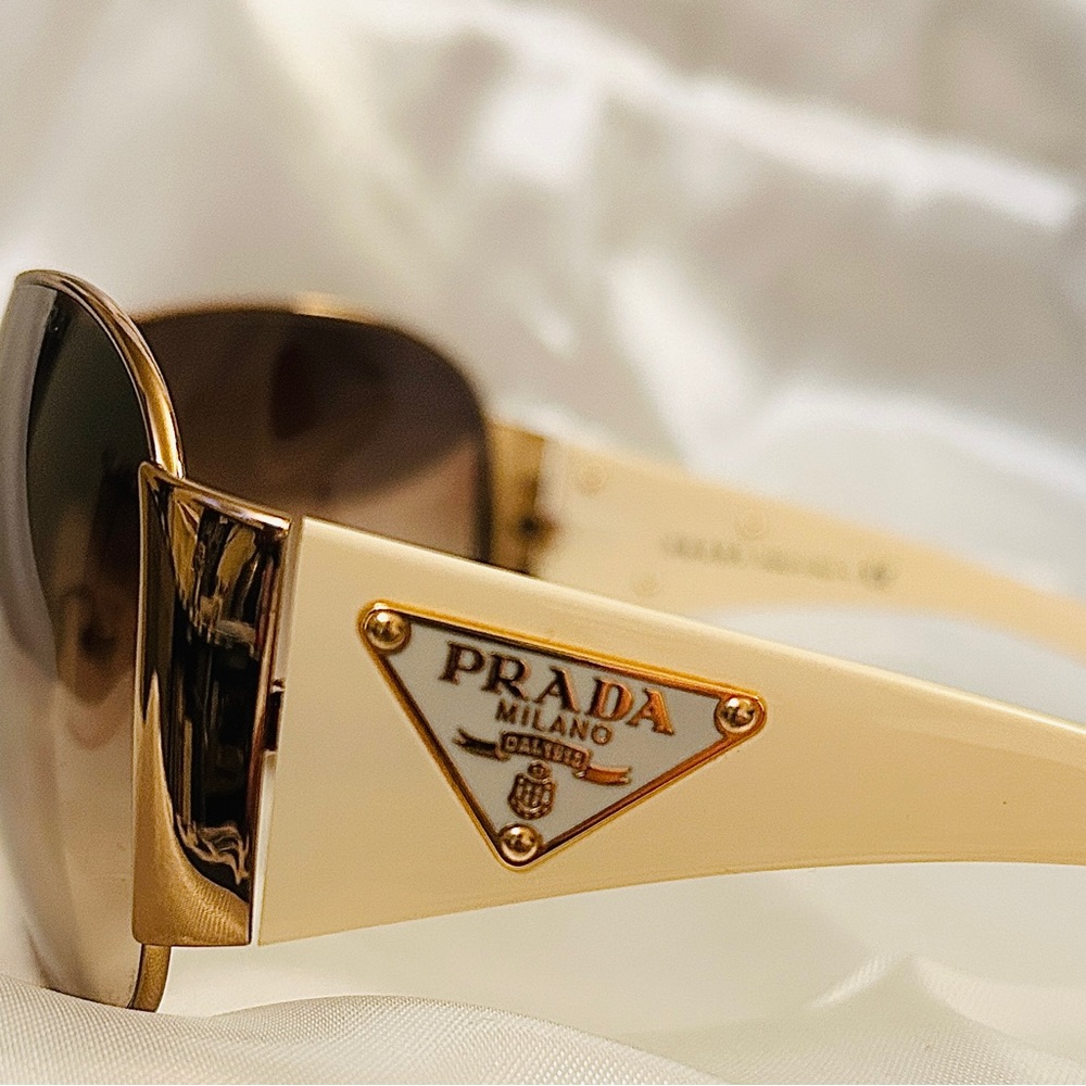 Prada Wraparound Sunglasses                            SPR 57LZVA-651 120 3N